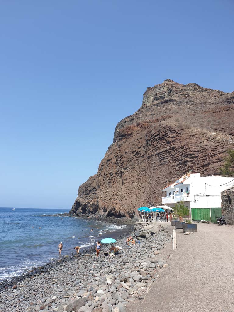 Tasarte beach and bar at the background